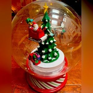 Christmas musical Santa’s sleigh snow globe 11”